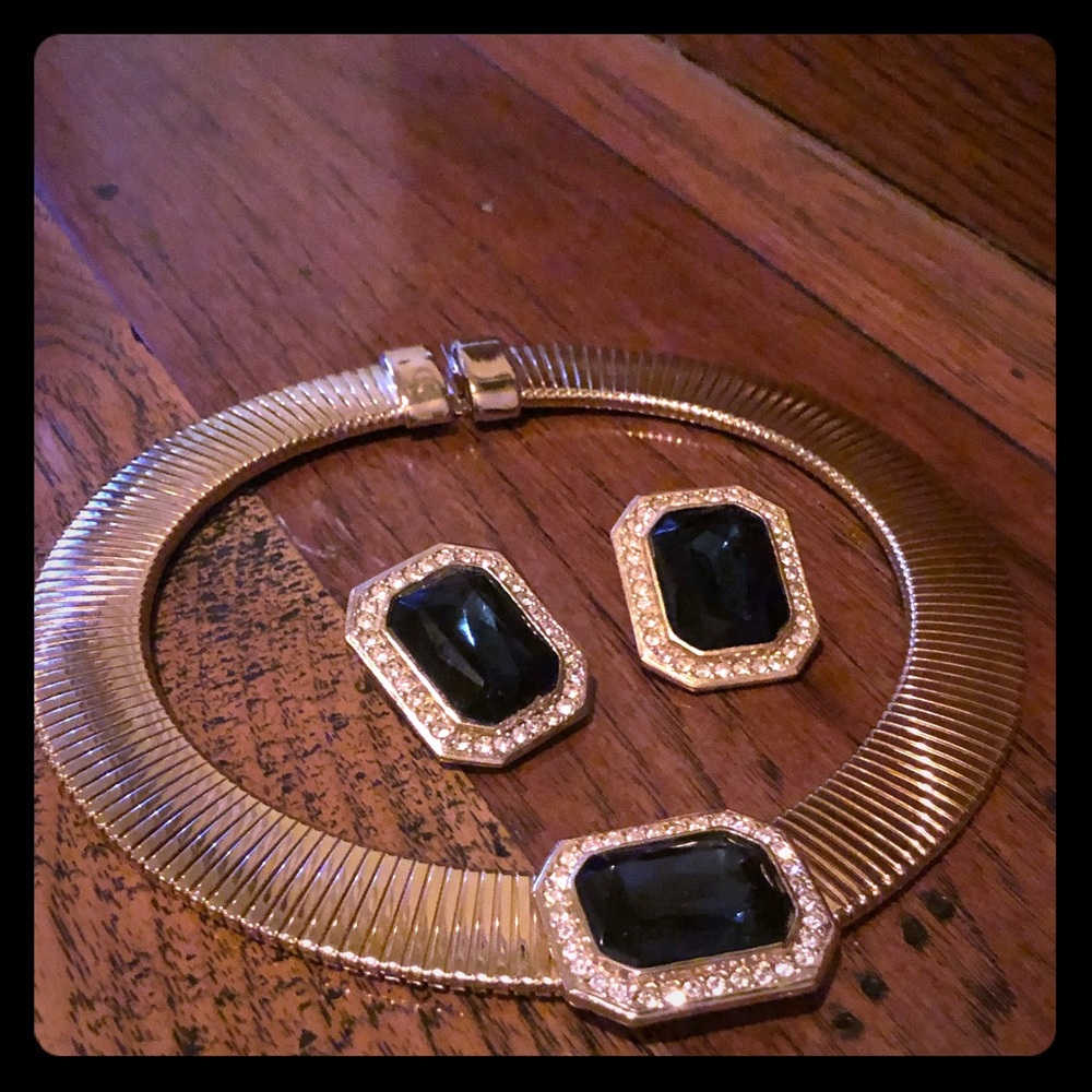 Gold tone necklace with matching clip on earrings